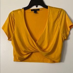 Crisscross cropped blouse